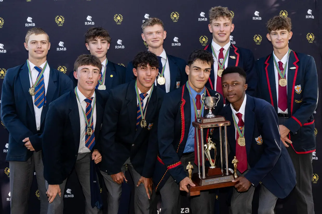 First Eight crew collected the Overall Boys School Winners trophy on behalf of St Benedict_s